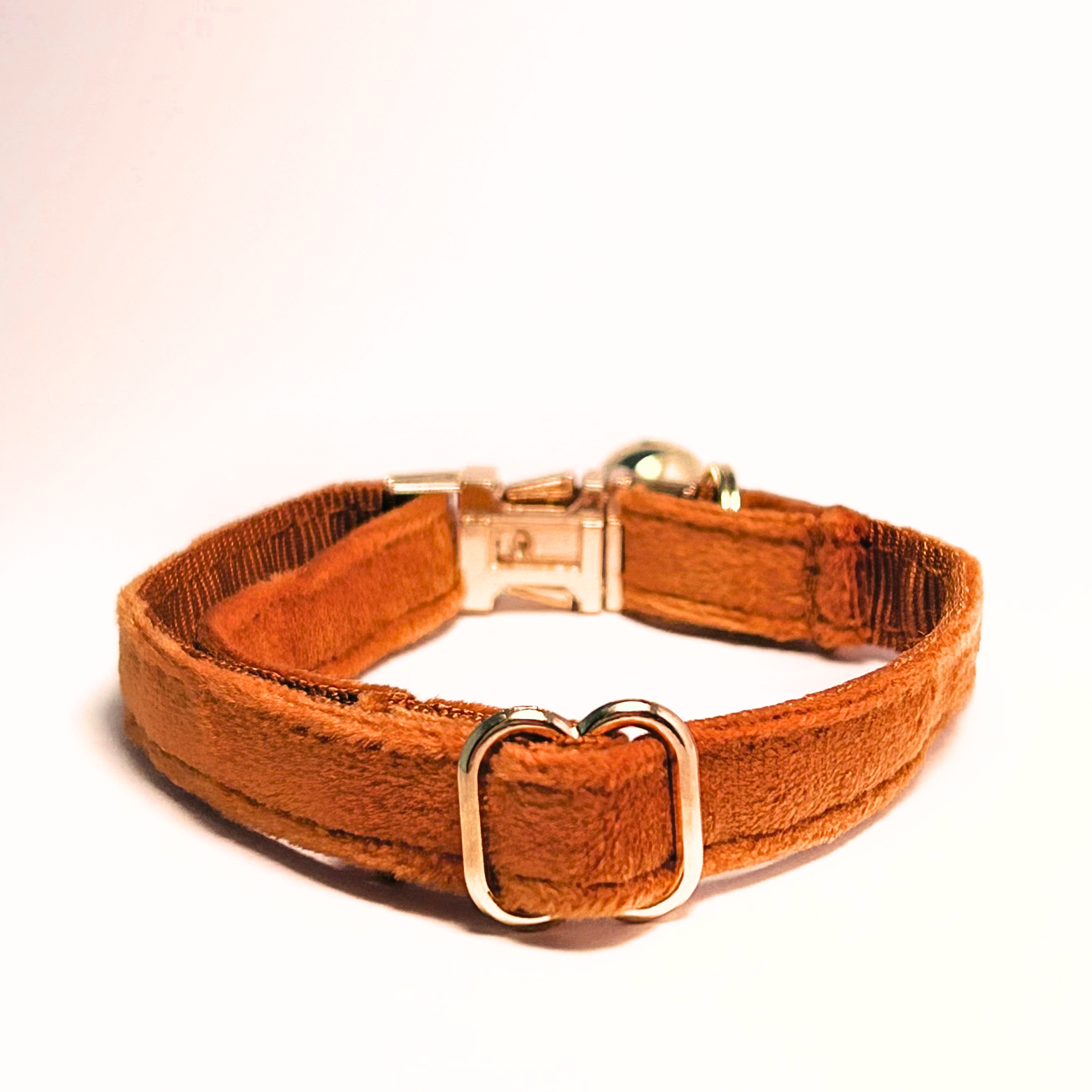 Personalised velvet cat collar - light brown colour with a gold buckle and bell. Add personalised engraving on the buckle.