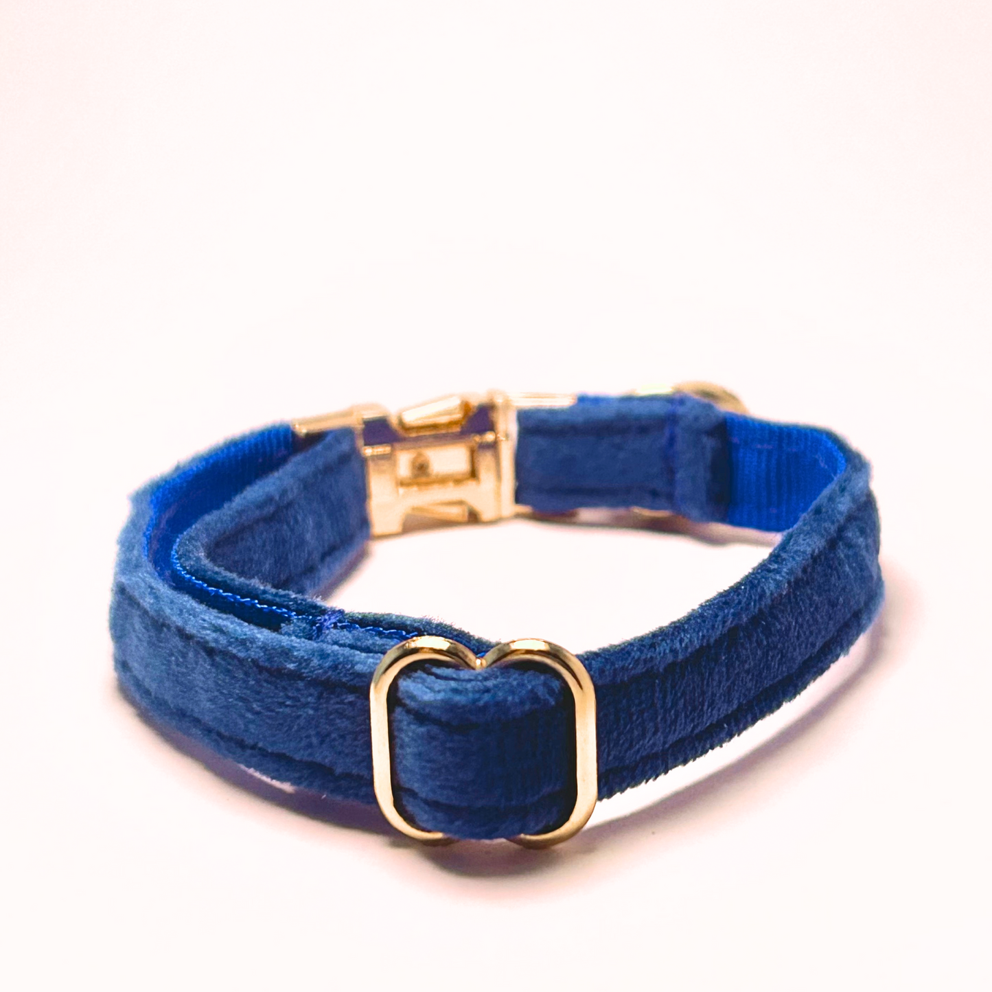 Personalised velvet cat collar - royal blue colour with a gold buckle and bell. Add personalised engraving on the buckle.