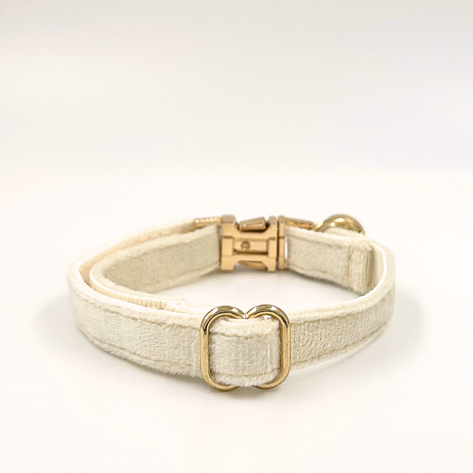 Personalised velvet cat collar - white colour with a gold buckle and bell. Add personalised engraving on the buckle.