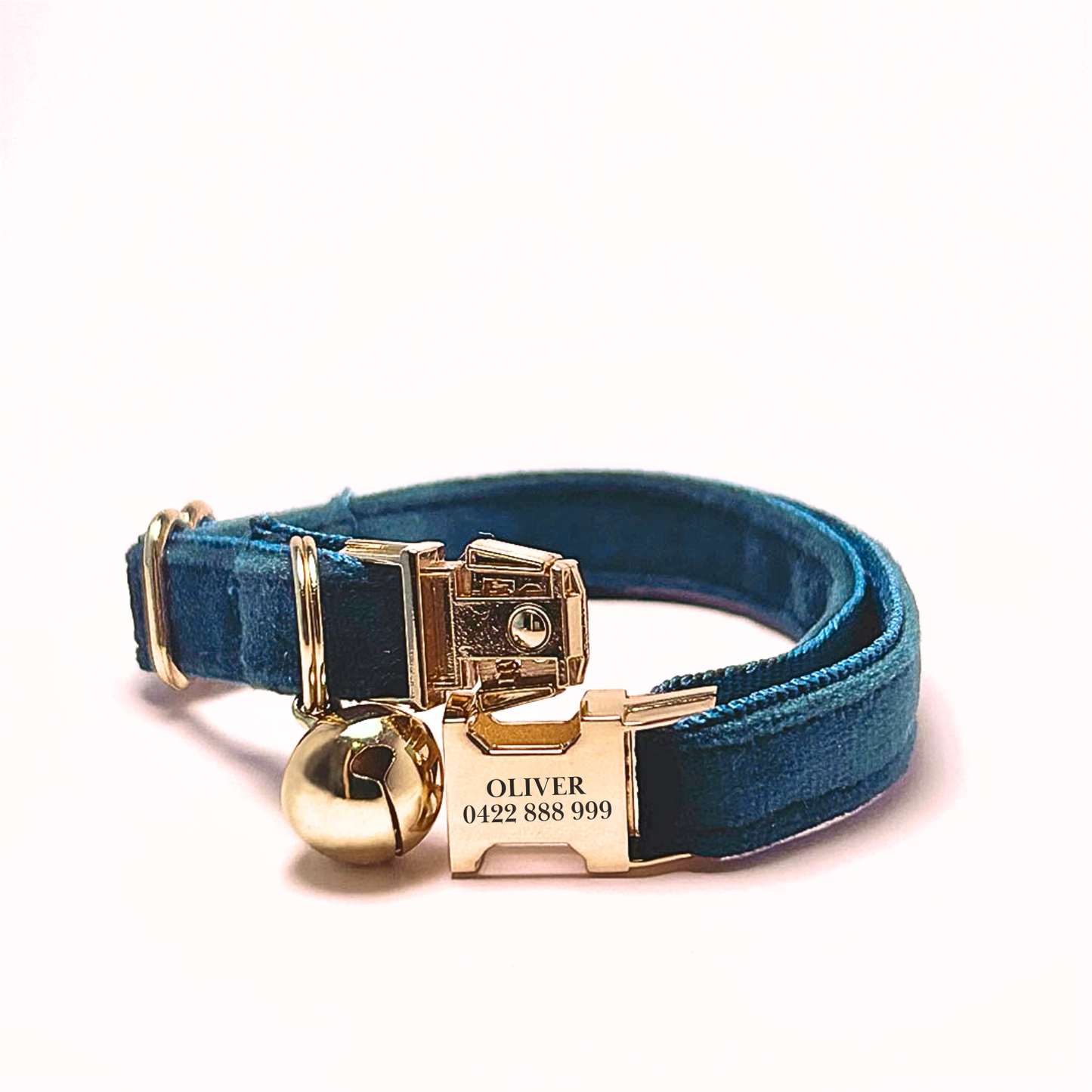 Personalised velvet cat collar - teal colour with a gold buckle and bell. Add personalised engraving on the buckle.