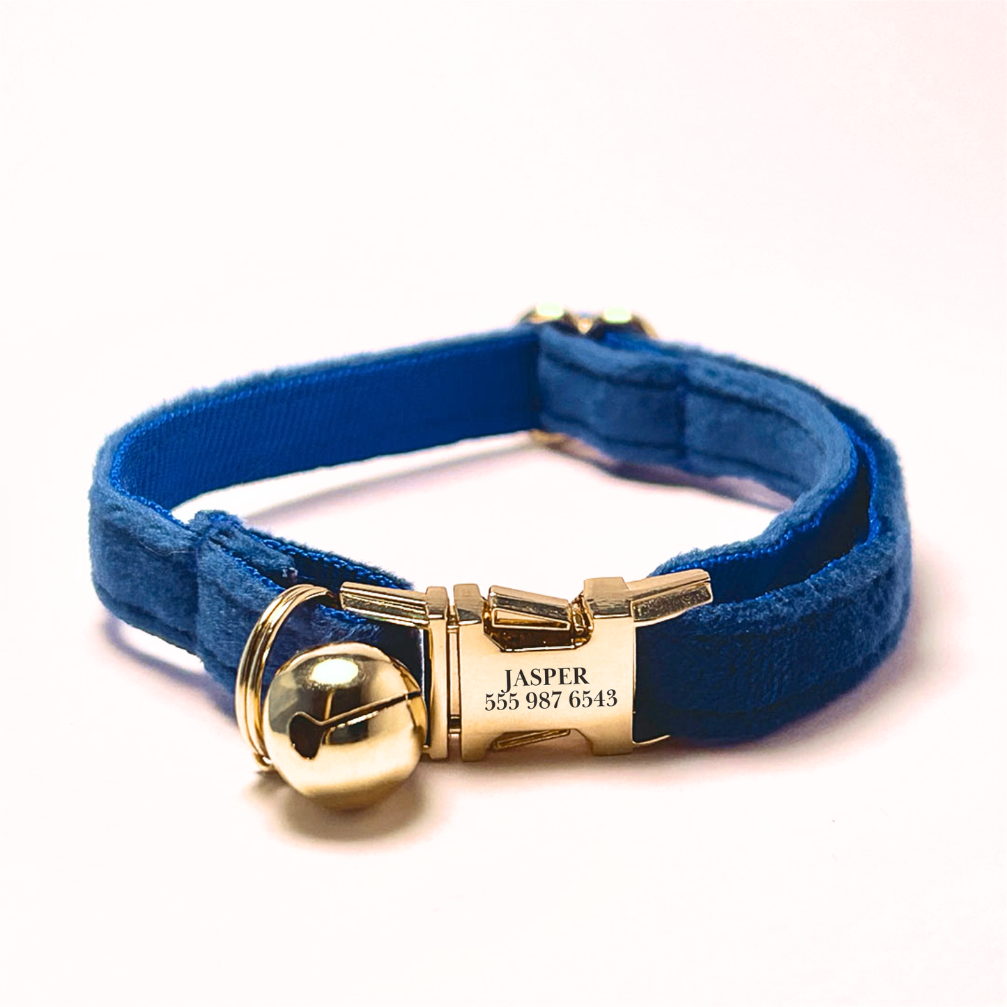 Personalised velvet cat collar - royal blue colour with a gold buckle and bell. Add personalised engraving on the buckle.