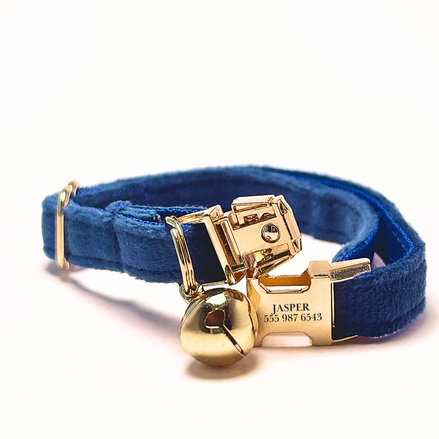 Personalised velvet cat collar - royal blue colour with a gold buckle and bell. Add personalised engraving on the buckle.